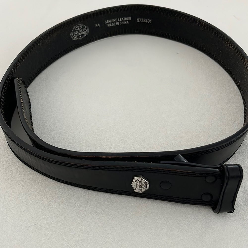 Cavender’s brand black/ brown leather belt. Size 34 JUST BELT NO BUCKLE